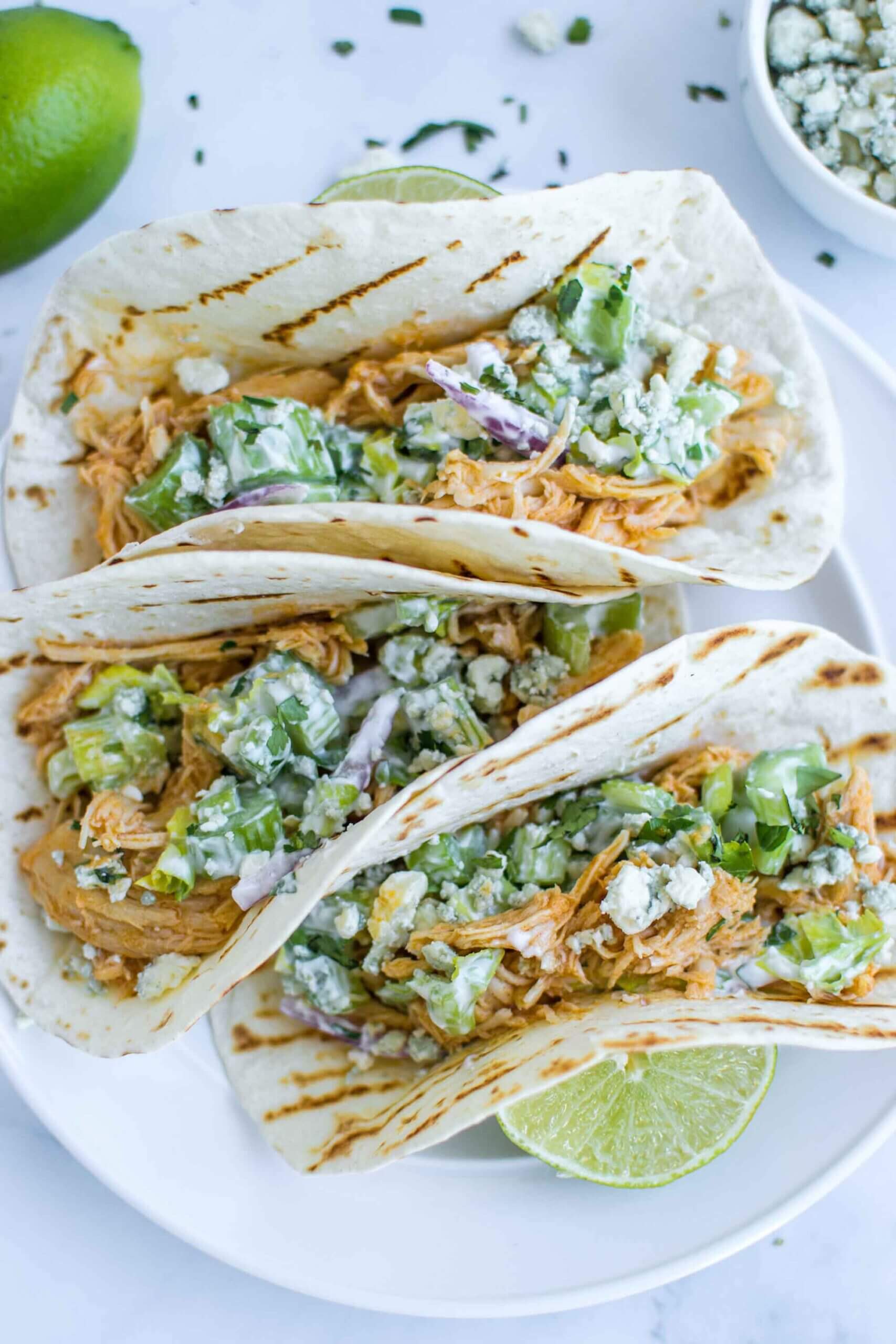 Buffalo Chicken Tacos with Celery Slaw on a plate