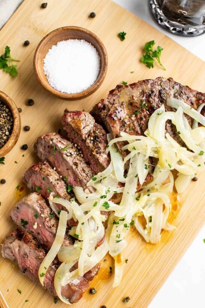 Grilled Steak with Garlic Butter Onions