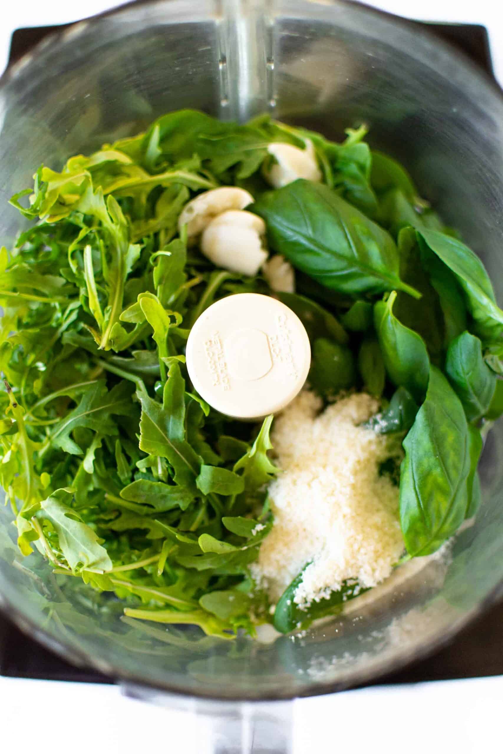 How to make Basil Arugula Pesto Step 1. All ingredients in the food processor.
