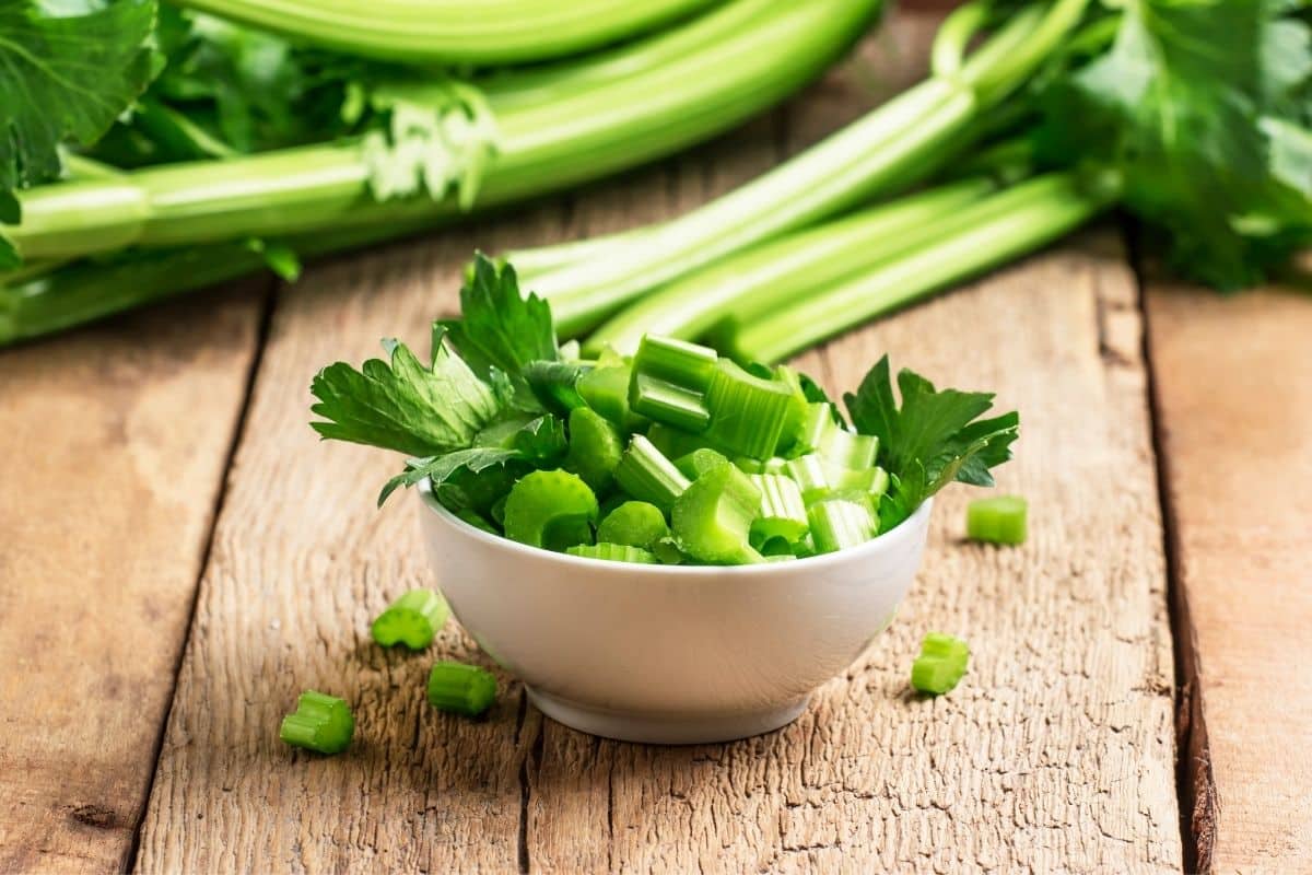 Cut up celery pieces in a bowl