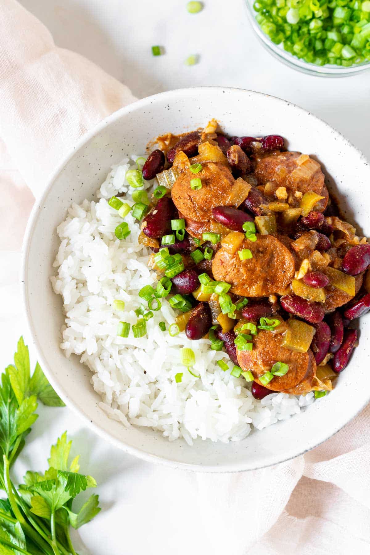 Instant Pot Red Beans and Rice in a bowl with scallions