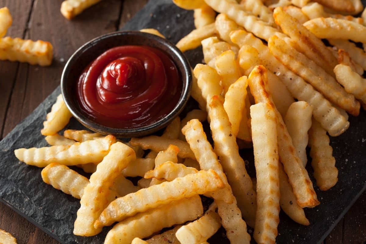 24 Easy Sides for Grilled Cheese: french fries on a plate with ketchup