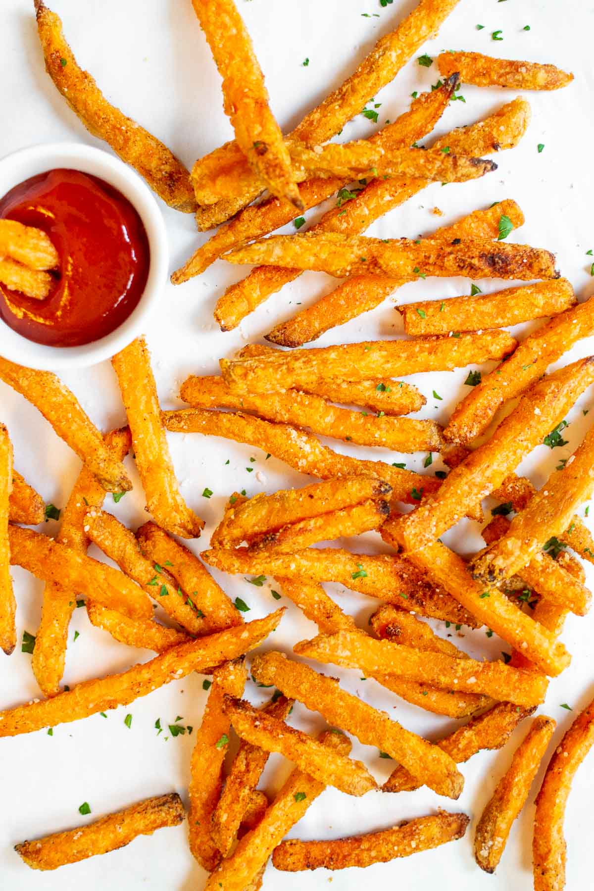 Sweet potato fries with a small bowl of ketchup