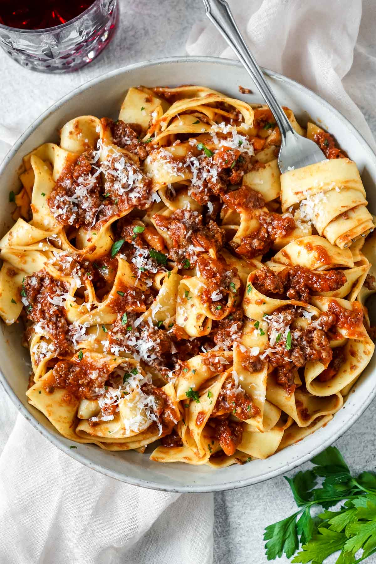 A bowl of bison bolognese in a bowl with a fork. 