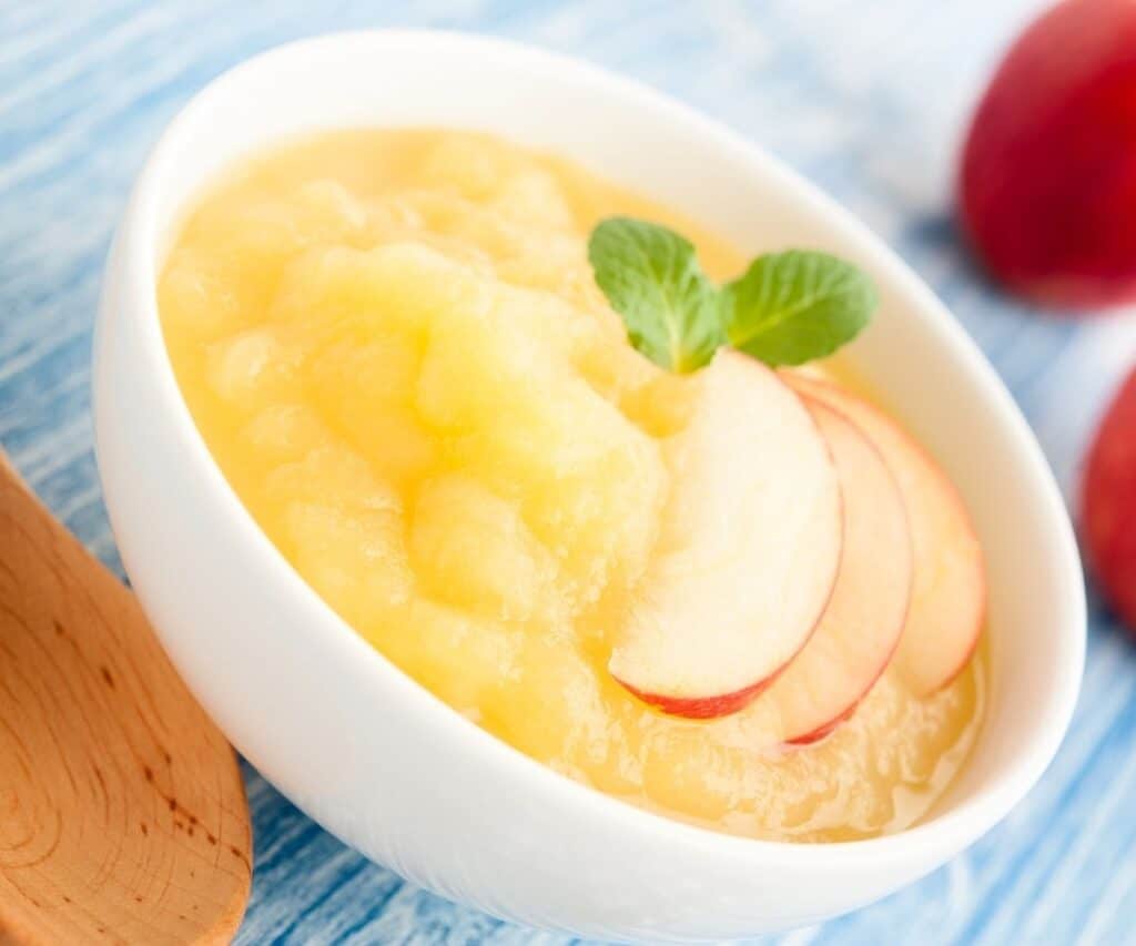 Apple sauce in a white bowl.