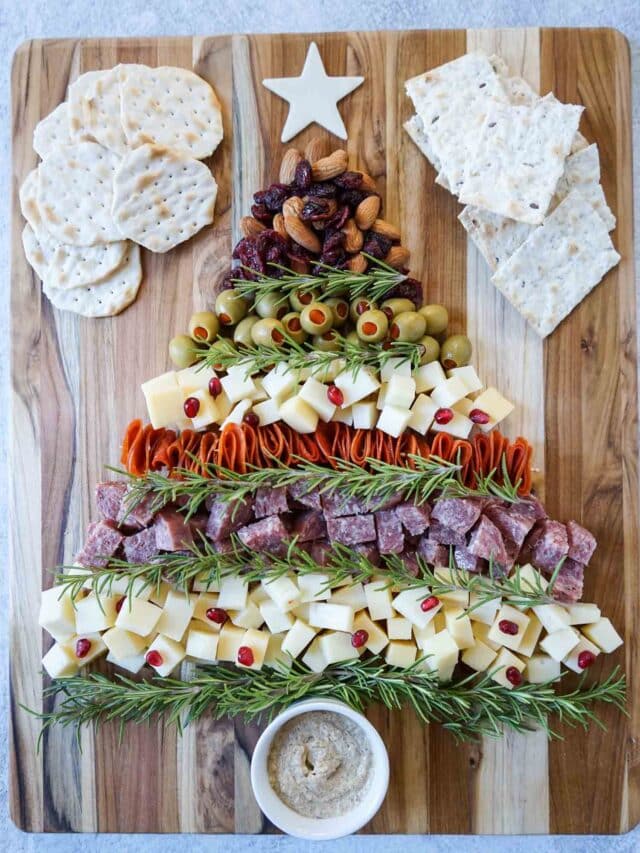 Christmas tree charcuterie board with water crackers.