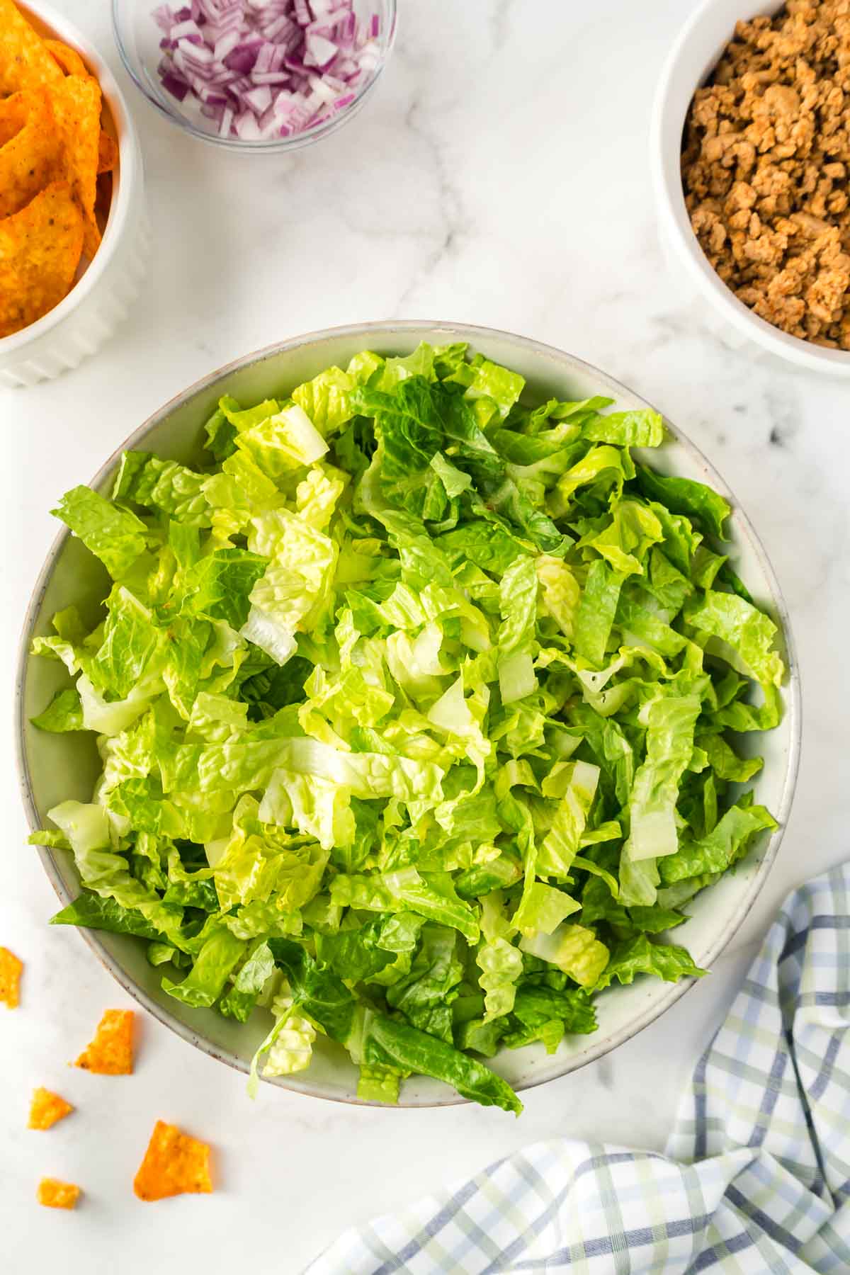Romaine lettuce in a large salad bowl.