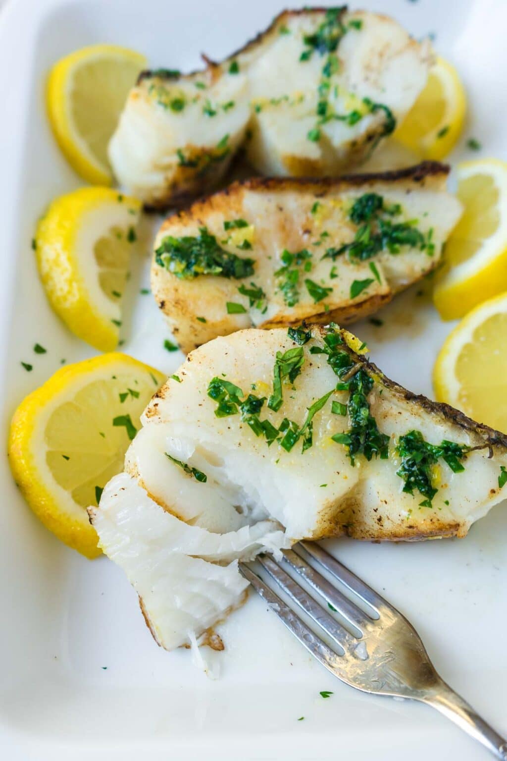 Pan Seared Chilean Sea Bass with Herb Butter Sauce | Get On My Plate