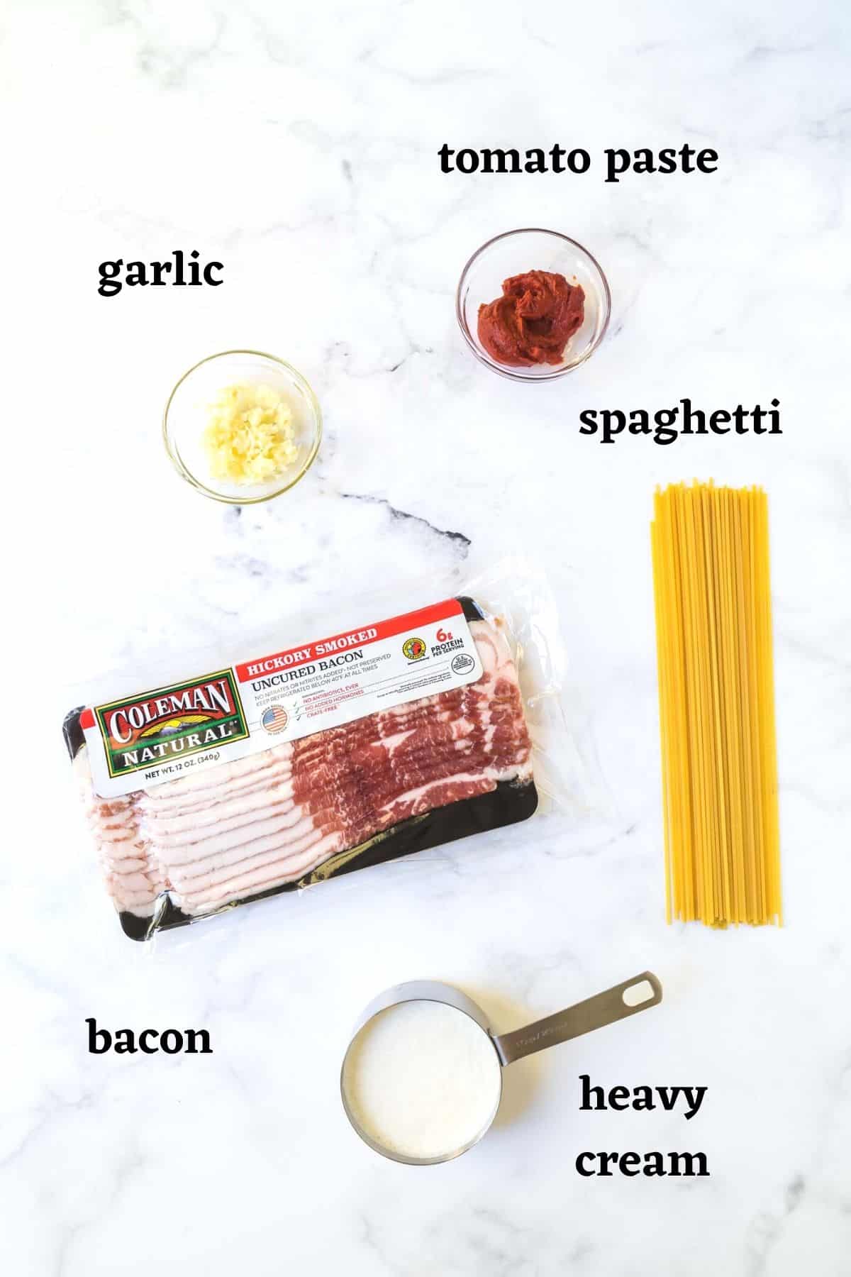 Ingredients needed to make Creamy Spaghetti with Bacon.