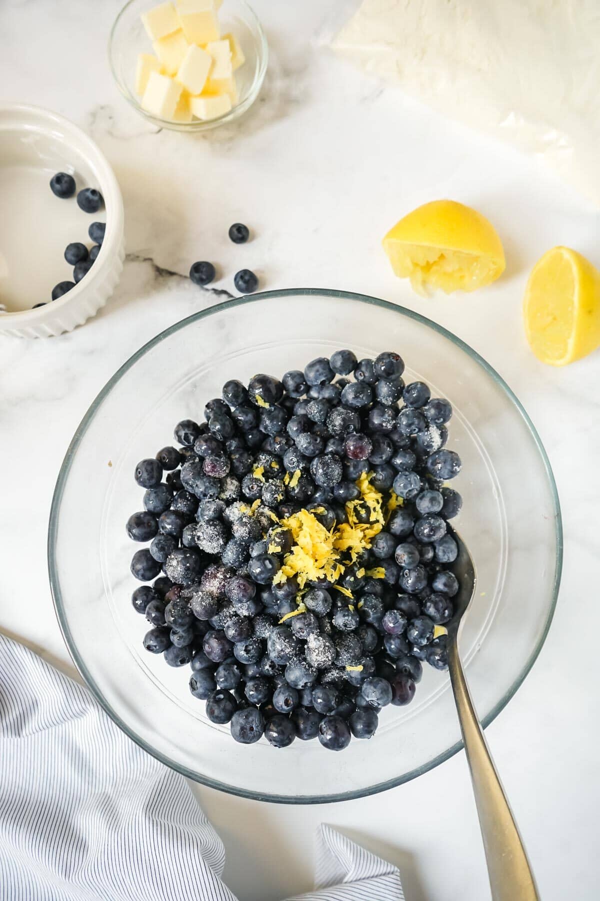 Blueberries, lemon juice, zest and sugar in a small bowl.