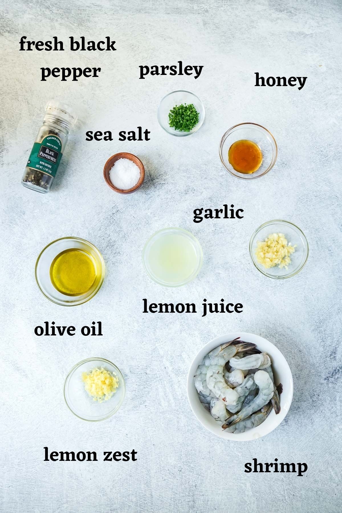 Ingredients needed to make oven baked shrimp skewers.