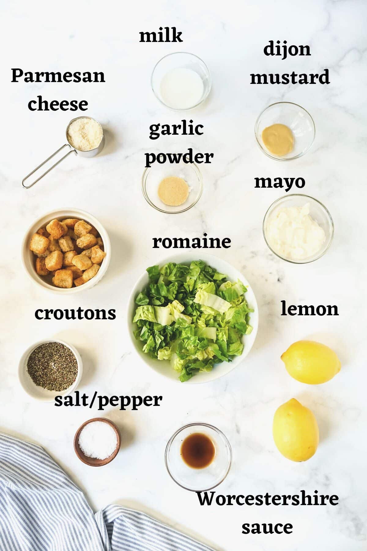 Ingredients needed to make Caesar salad without anchovies.