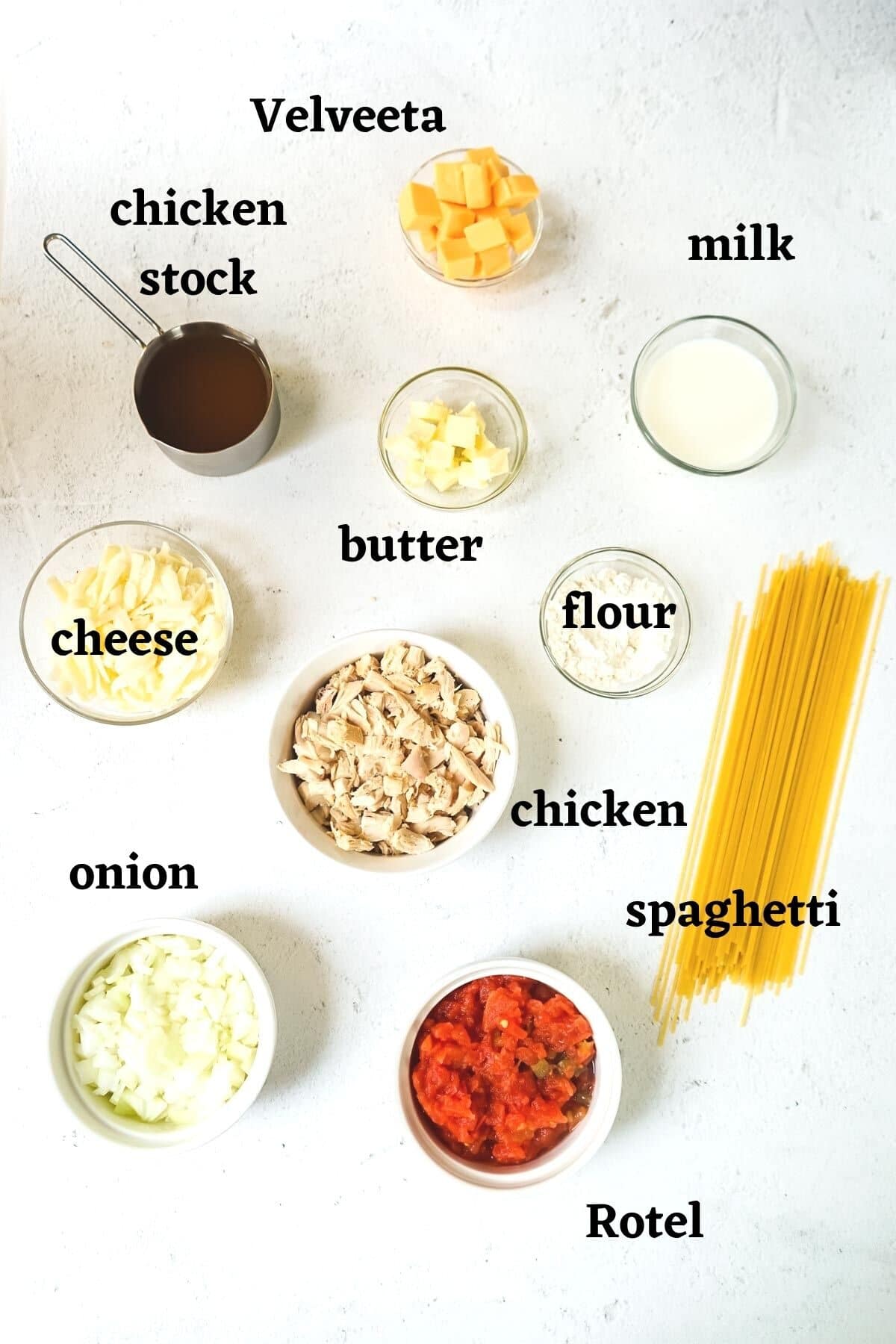 Ingredients needed for chicken spaghetti with Rotel and Velveeta.