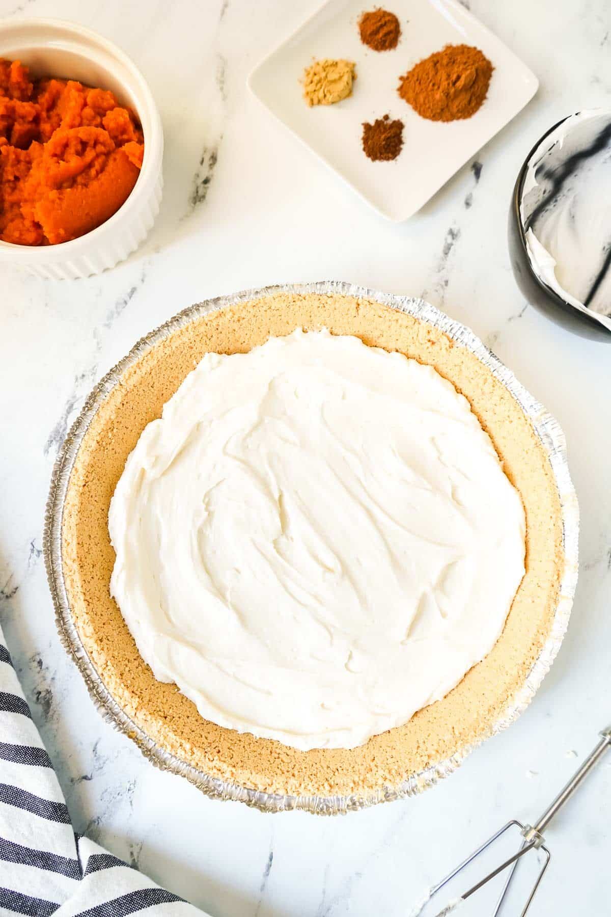 Cream cheese layer in the double layer pumpkin pie.
