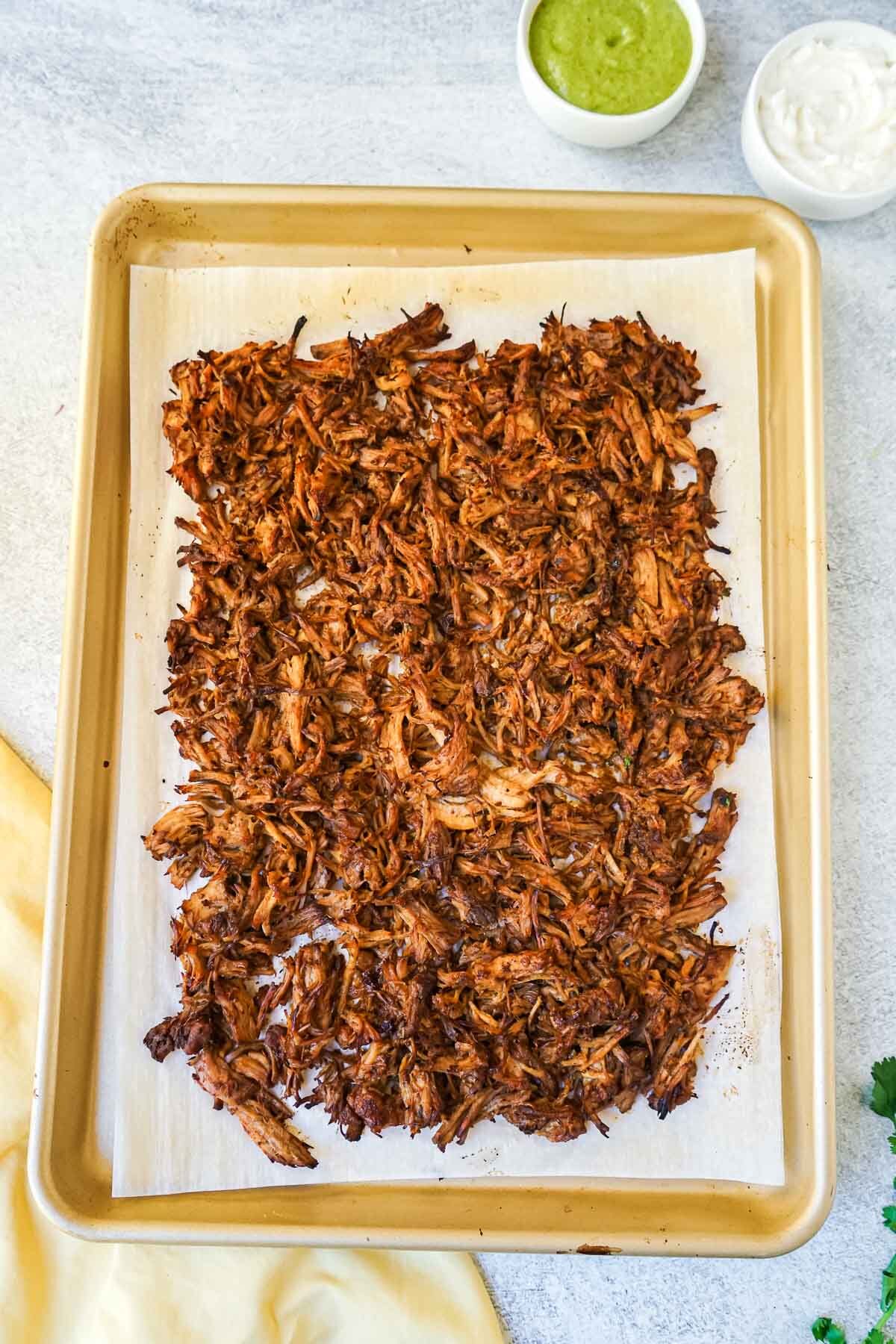 Crispy pork carnitas after being broiled in the oven.