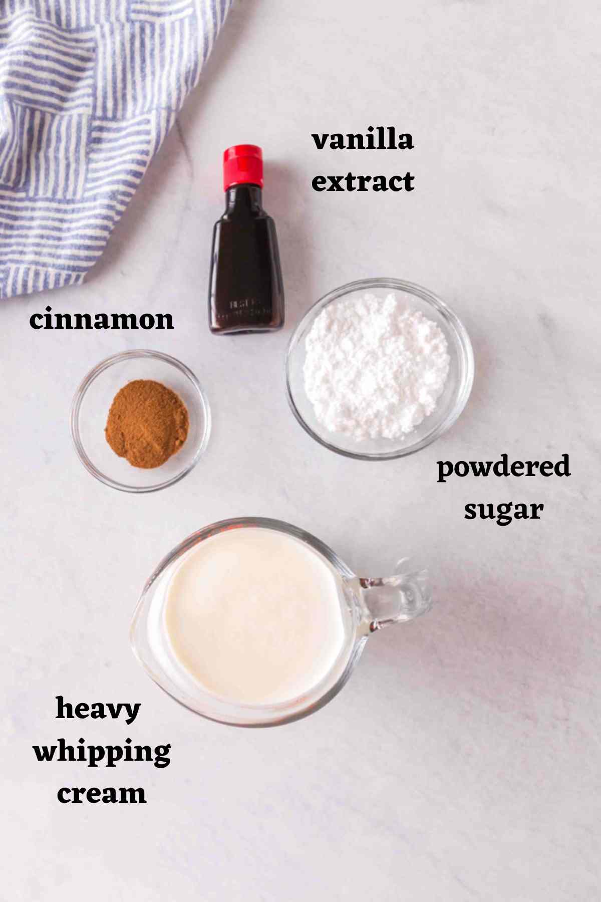 Ingredients needed to make homemade cinnamon whipped cream.