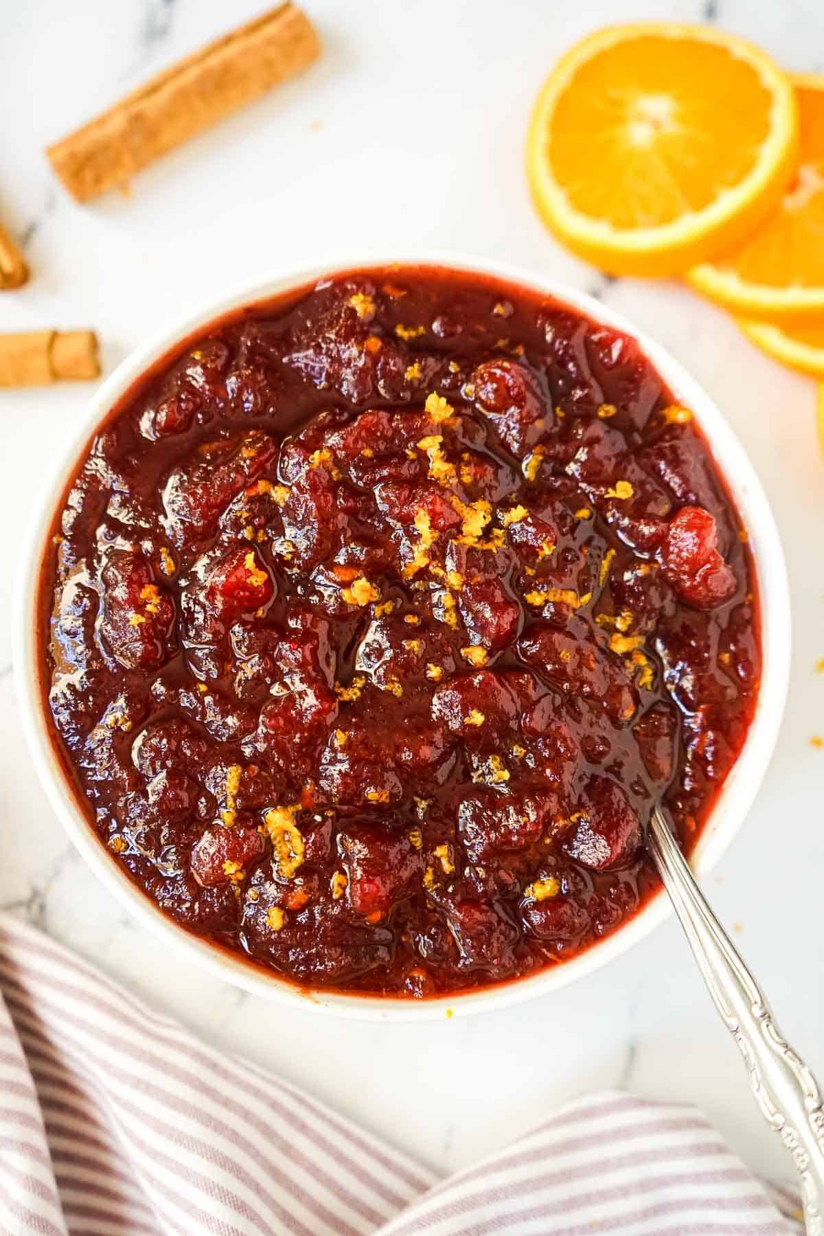 Cranberry sauce made from canned cranberries in a white serving bowl