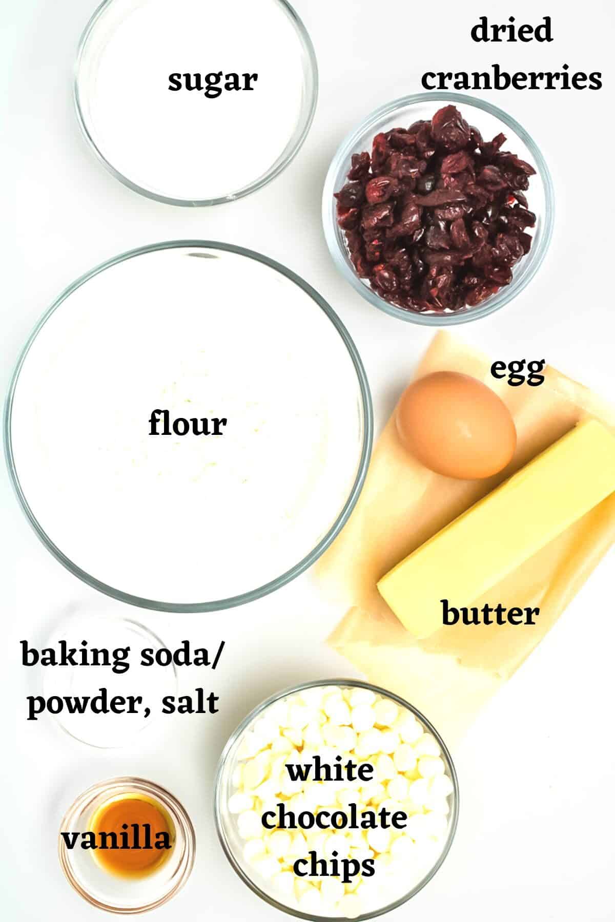 Ingredients needed to make White Chocolate Cranberry Cookies.
