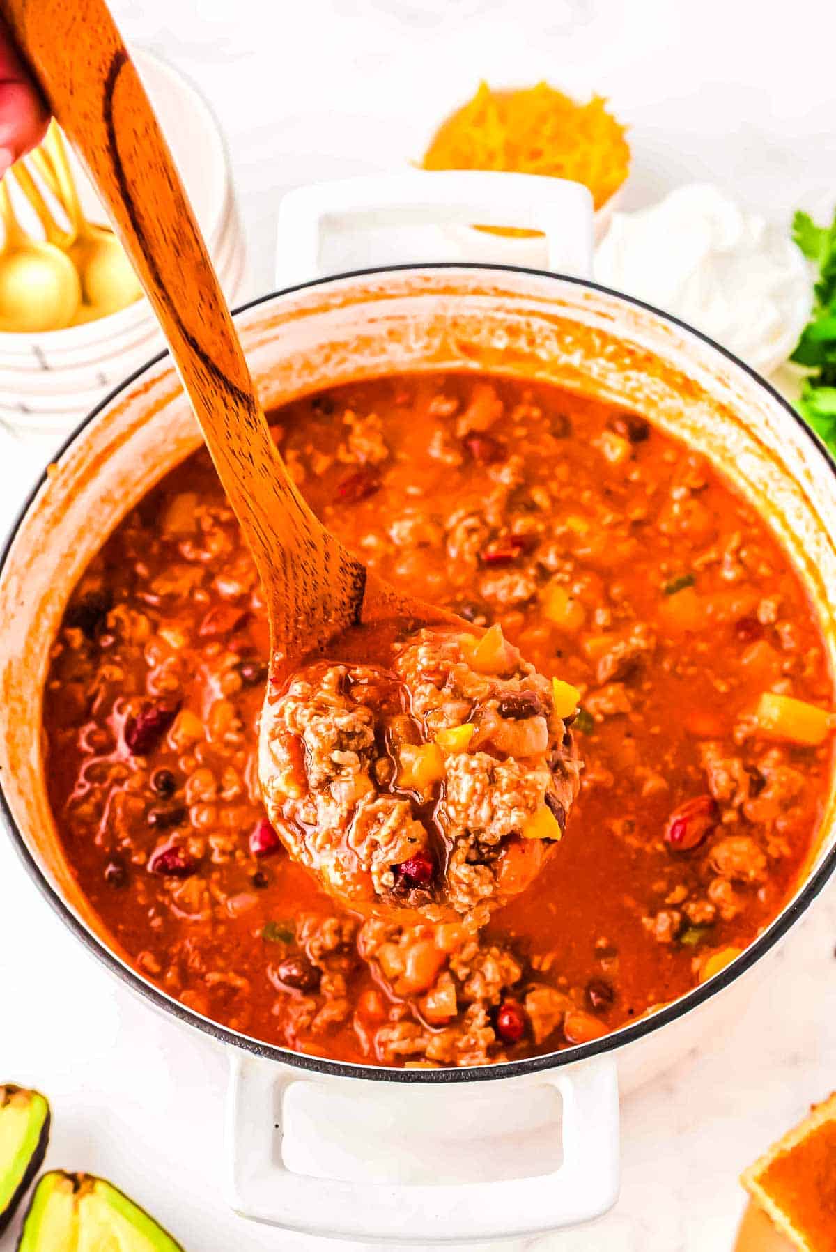 Easy 3 bean chili on a wooden ladle. 