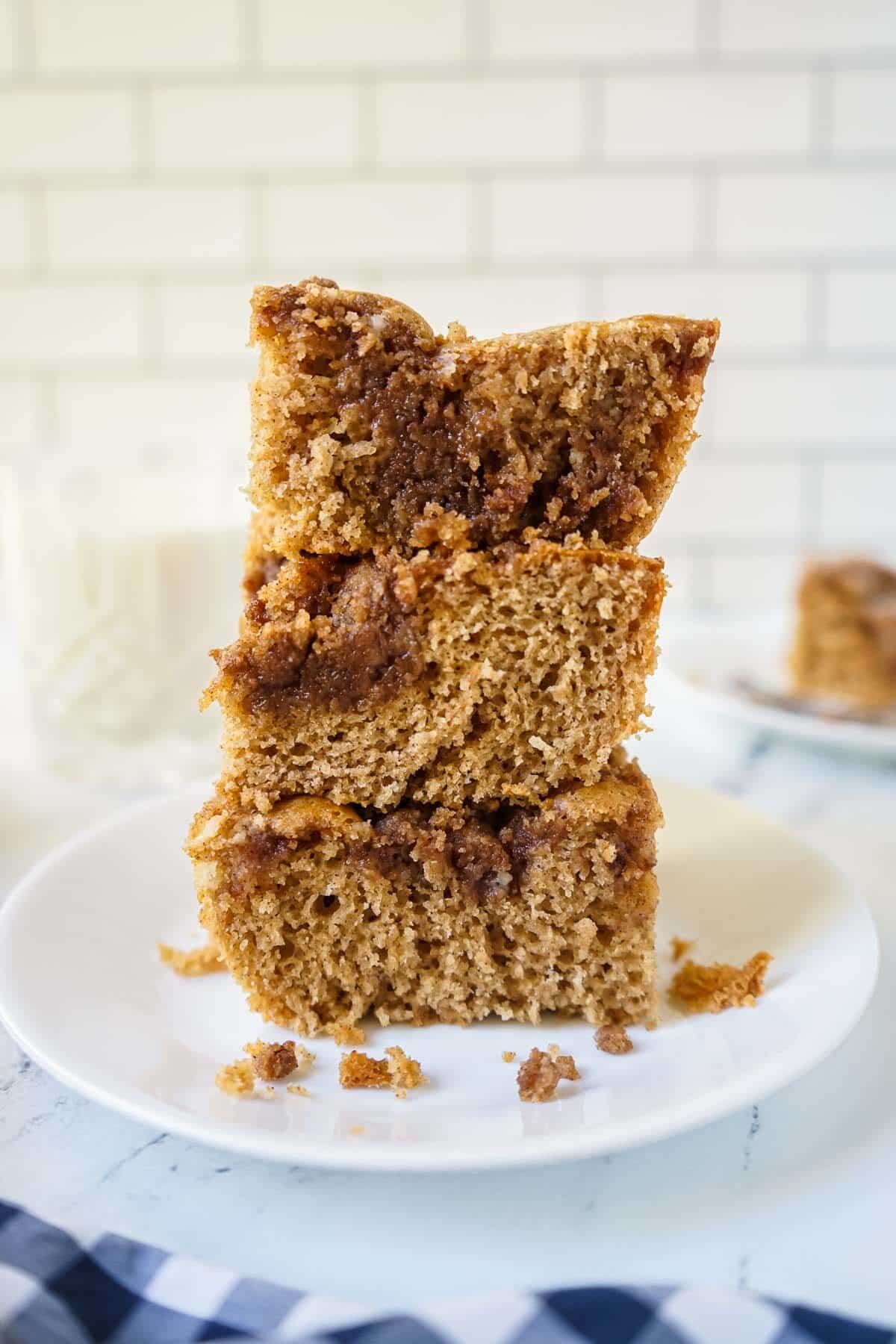 Three slices of Bisquick Coffee Cake stacked on top of one another.