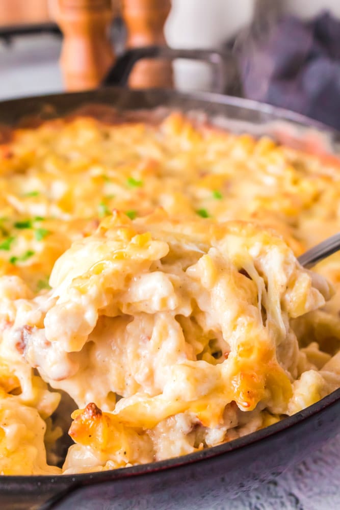 Cheesy Baked Bechamel Pasta Bake in a cast iron skillet.