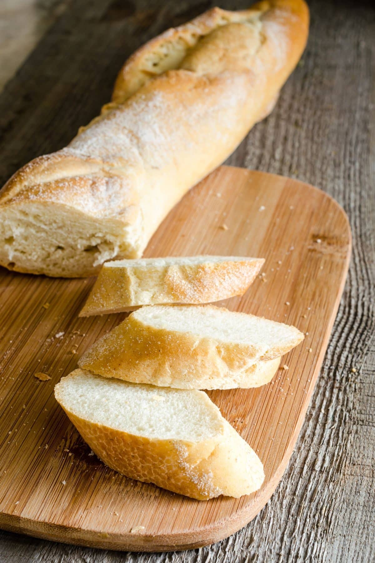 A loaf of french bread cut into slices.