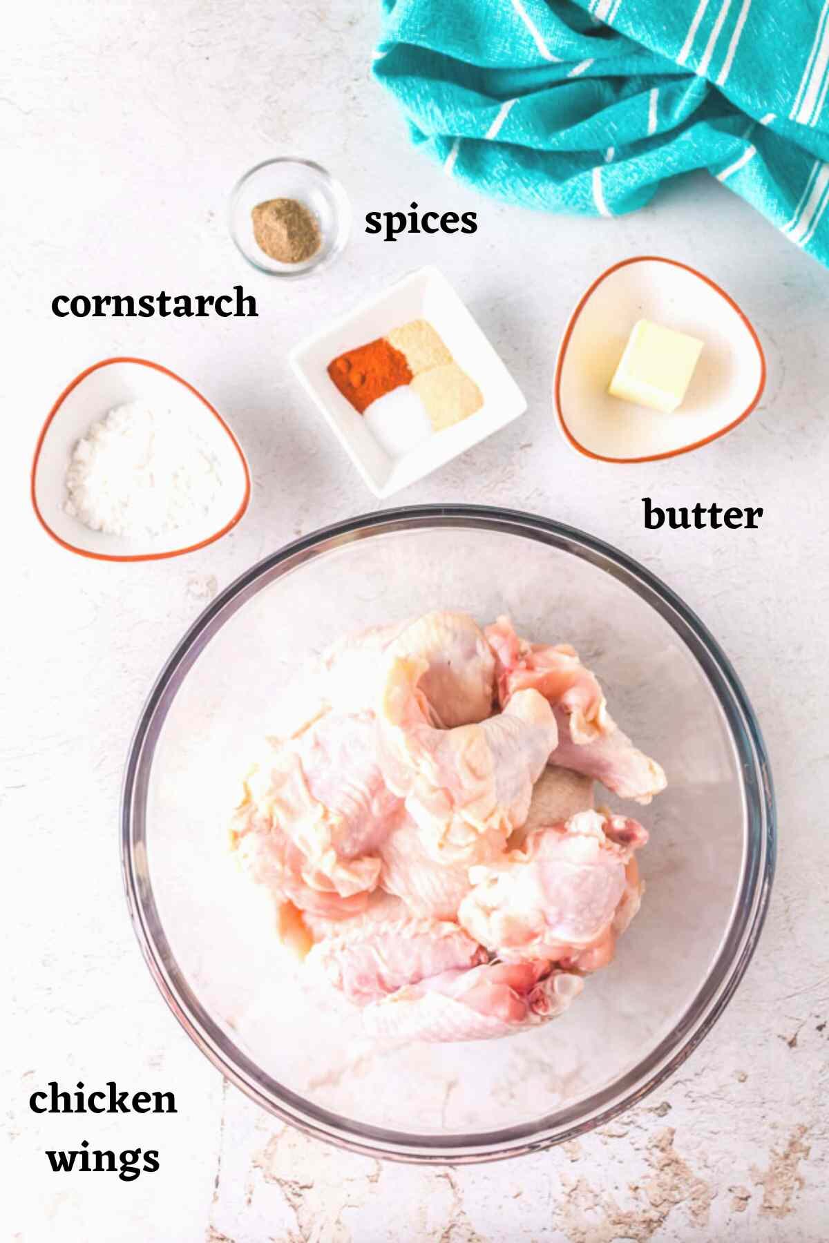 Ingredients needed to make crispy air fryer chicken wings with cornstarch.