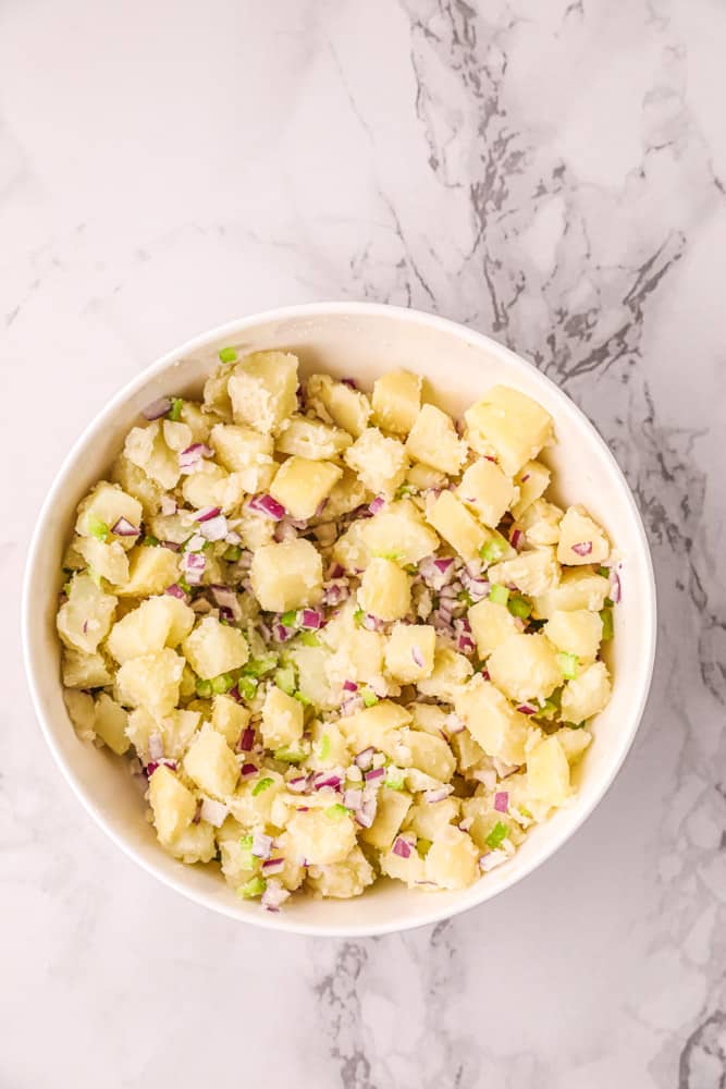 Potato salad without eggs before dressing is mixed in.