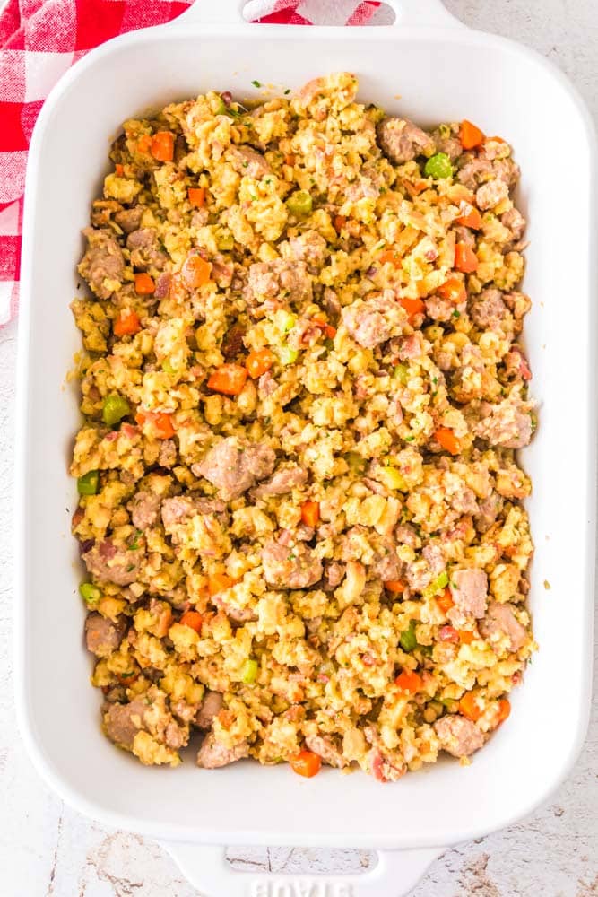 Italian Sausage Stuffing in a casserole dish ready to go into the oven.