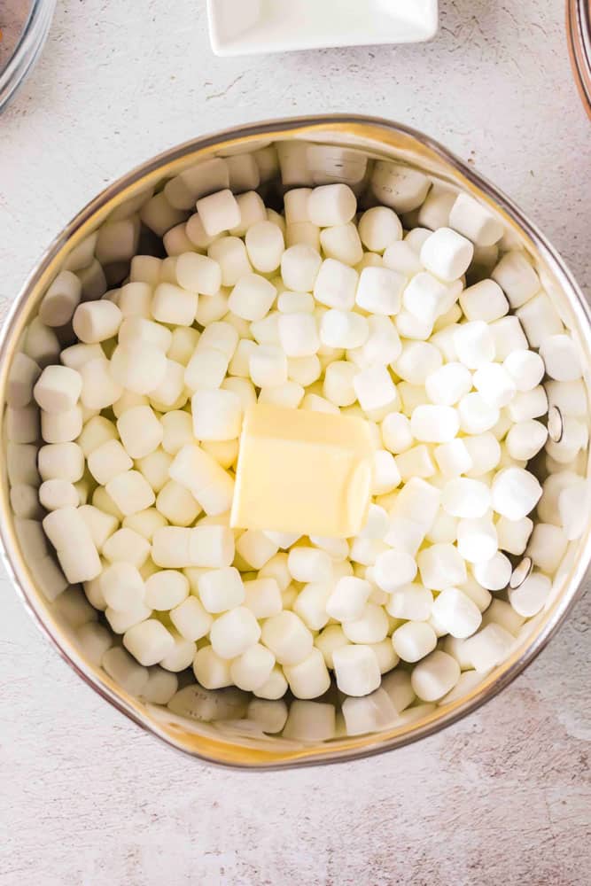 Mini marshmallows and butter being melted together.