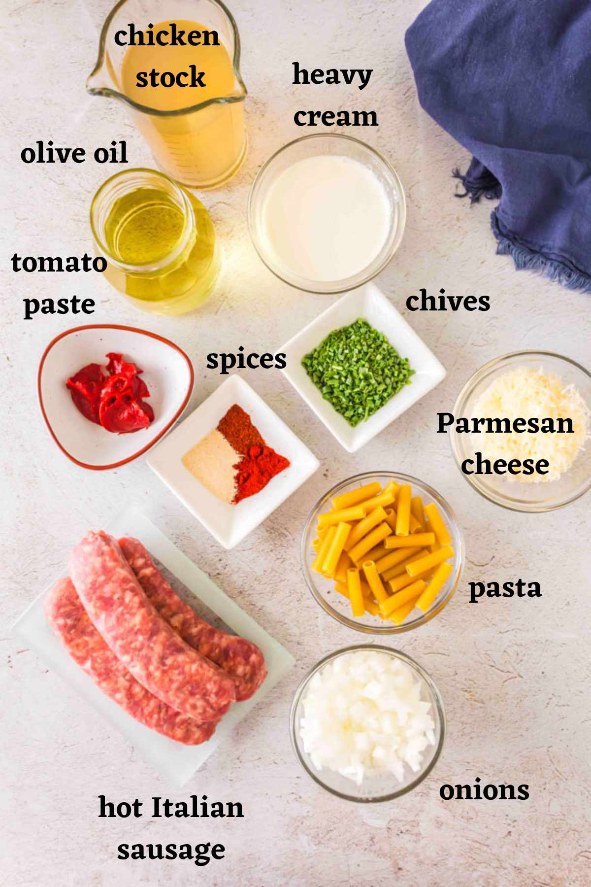 Ingredients needed to make Spicy Italian Sausage Pasta.