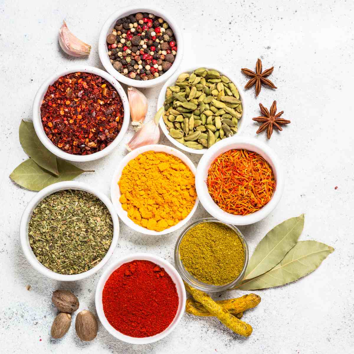 8 white bowls of essential spices for every kitchen