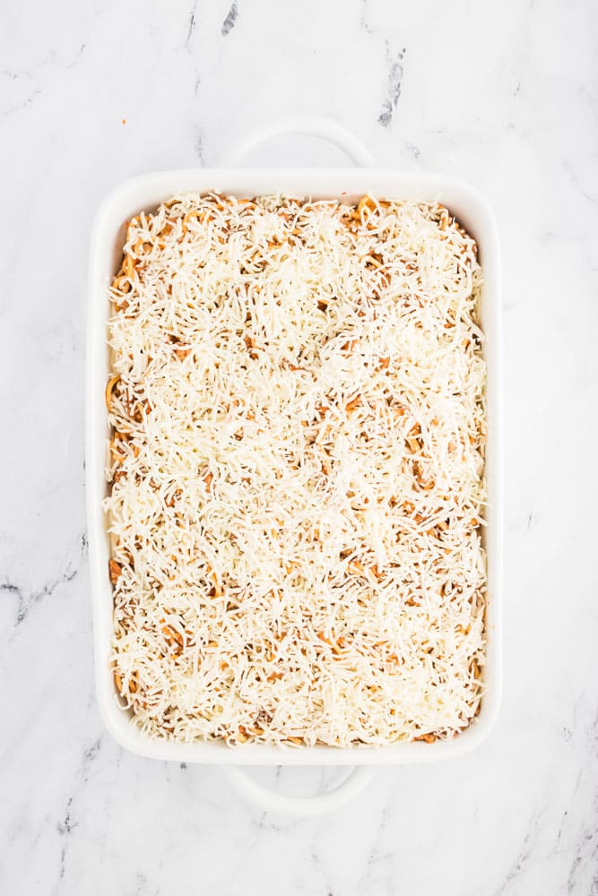 baked spaghetti prepared to be placed in the oven