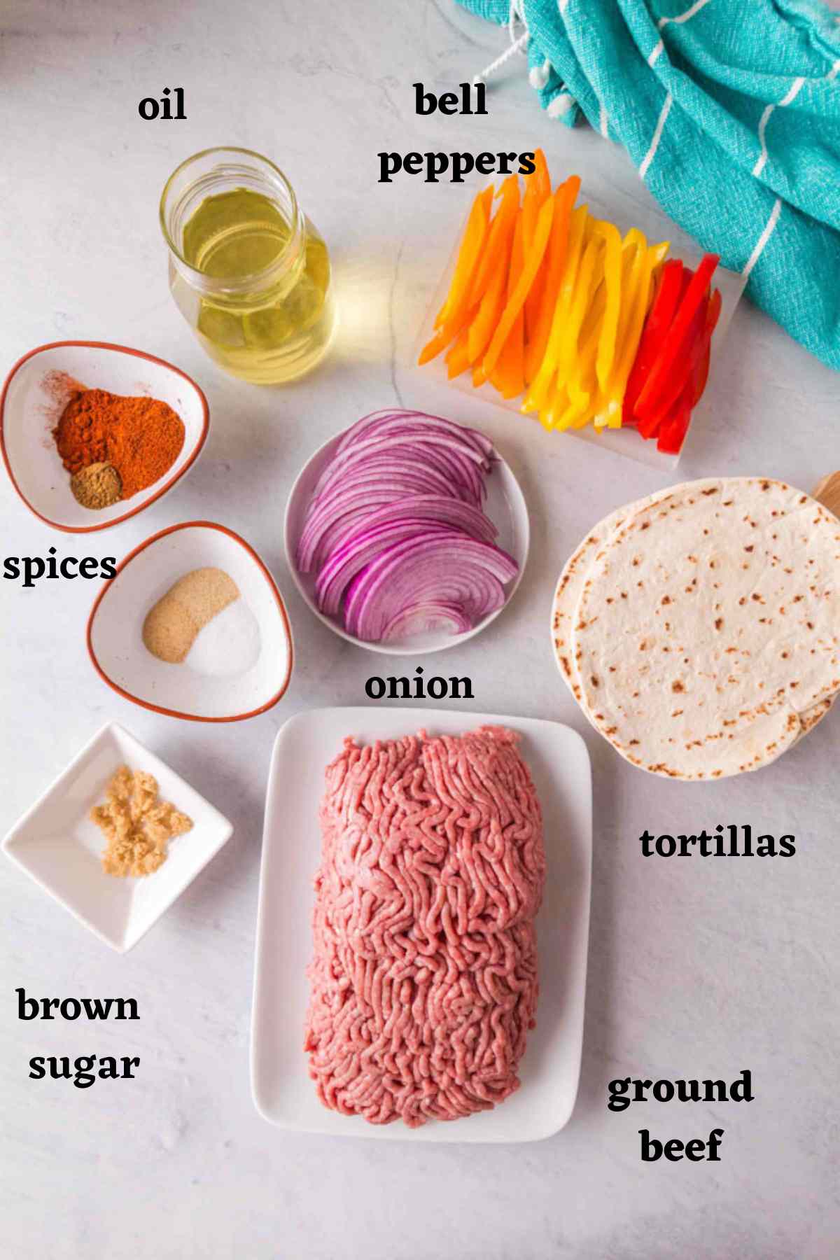 Ingredients needed to make ground beef fajitas.