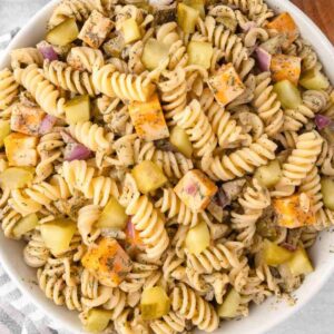 Dill pickle pasta salad in a white bowl