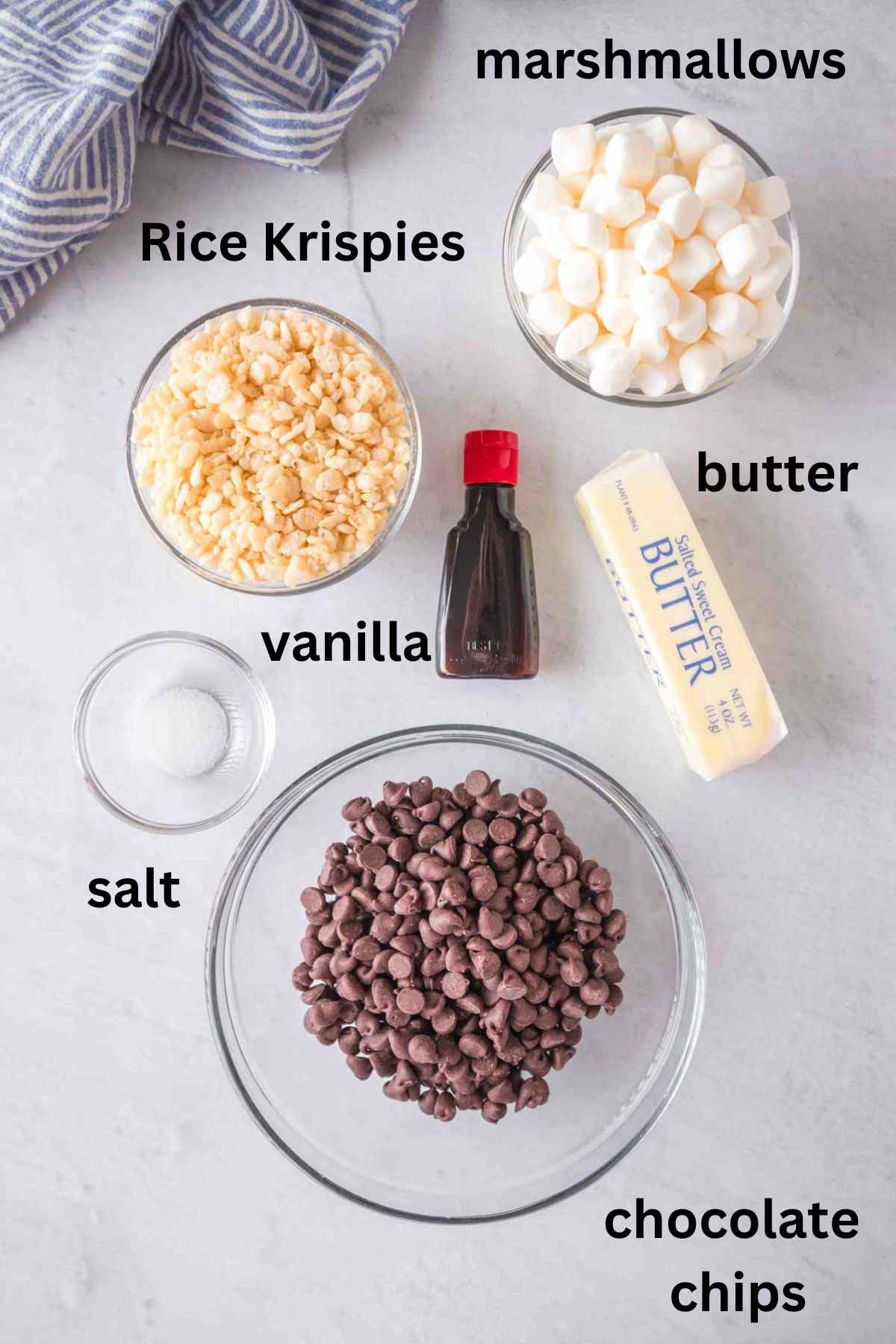 Ingredients needed to make chocolate dipped rice krispie treats.
