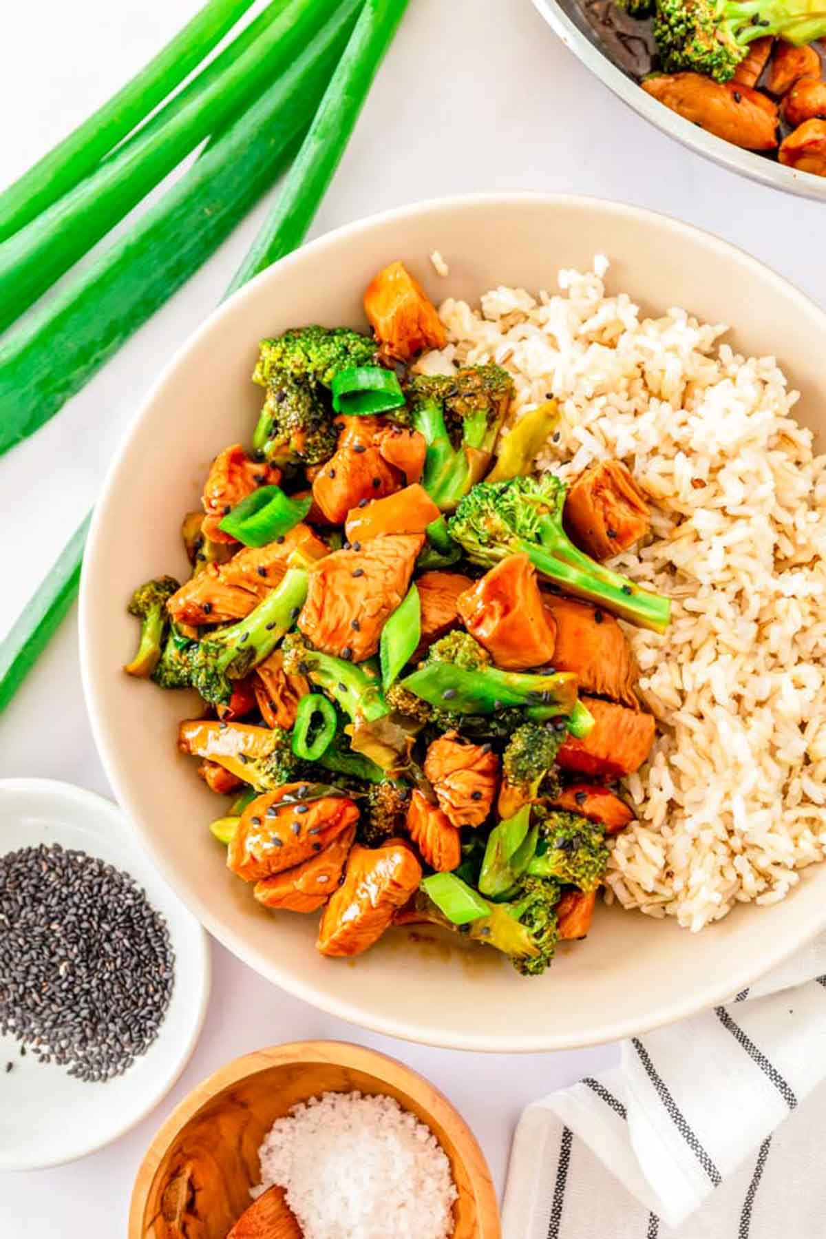 Easy chicken teriyaki with broccoli on a plate with rice.