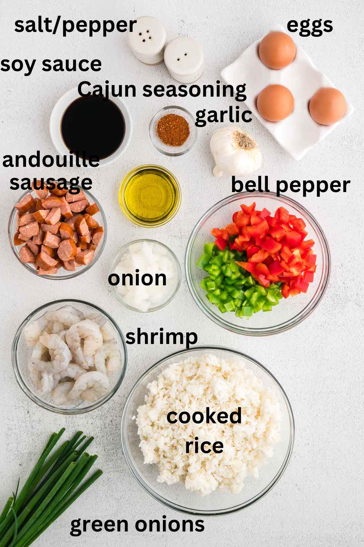 Ingredients needed for Cajun fried rice.