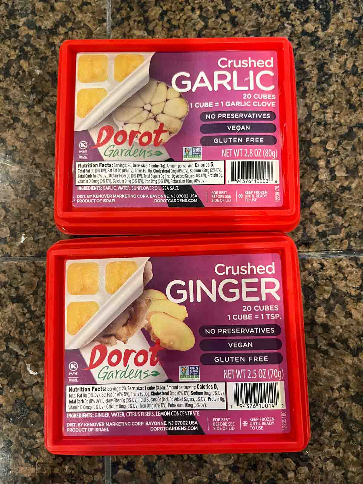 Containers of Trader Joe's frozen ginger and garlic. 