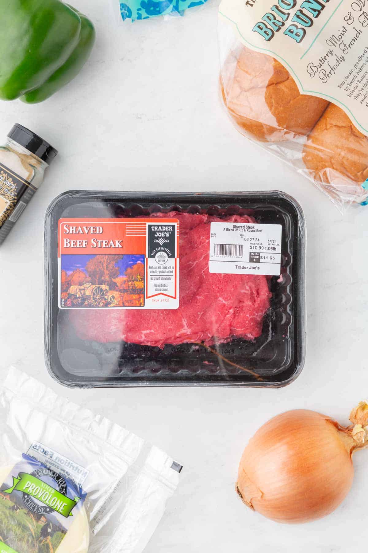 A package of Trader Joe's Shaved Beef Steak on a counter.