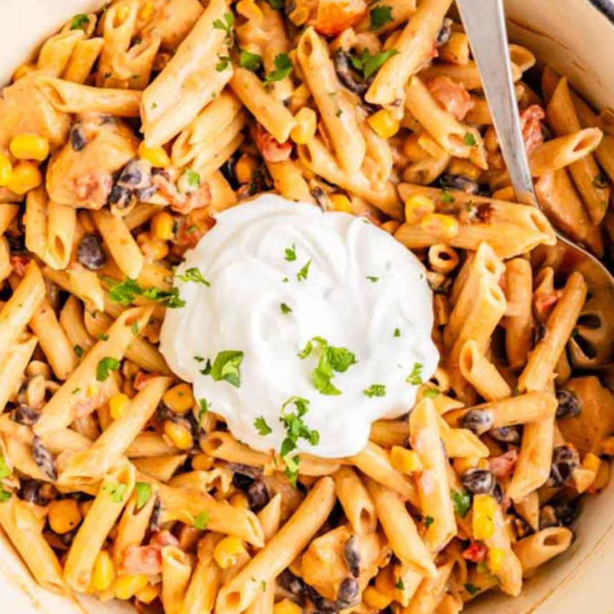 Creamy Southwest Chicken Pasta with a dollop of sour cream on top.
