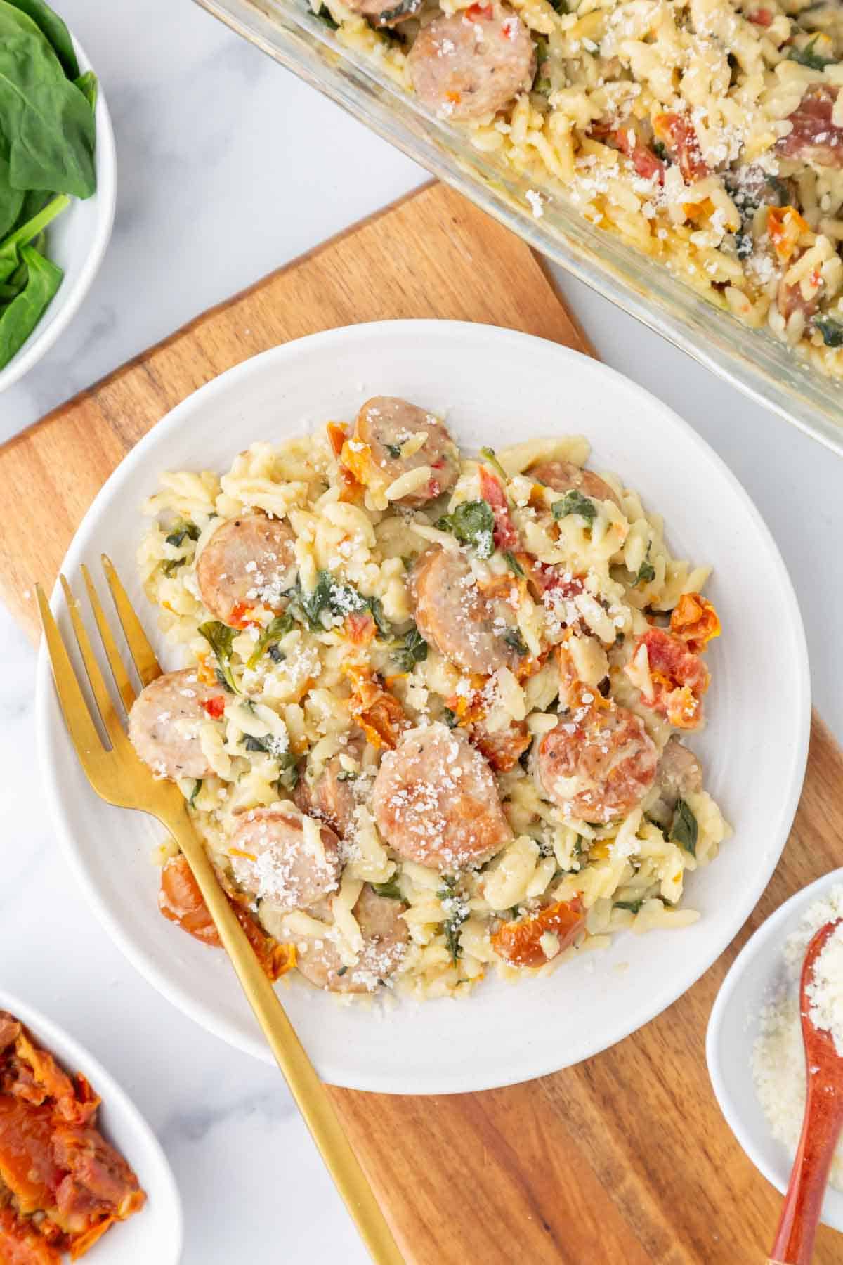 Trader Joe's sausage and orzo bake on a white plate.