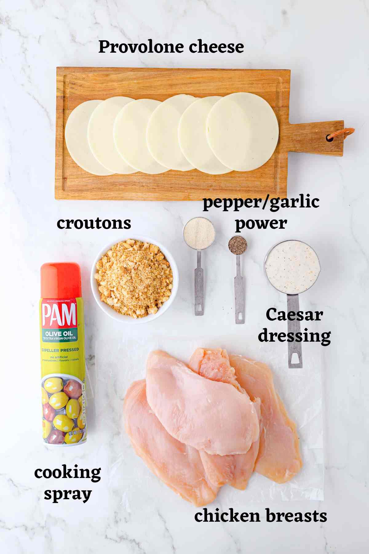 Ingredients needed to make Caesar chicken bake .