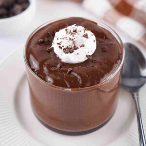 Hardboiled egg chocolate pudding with a dollop of whipped cream.