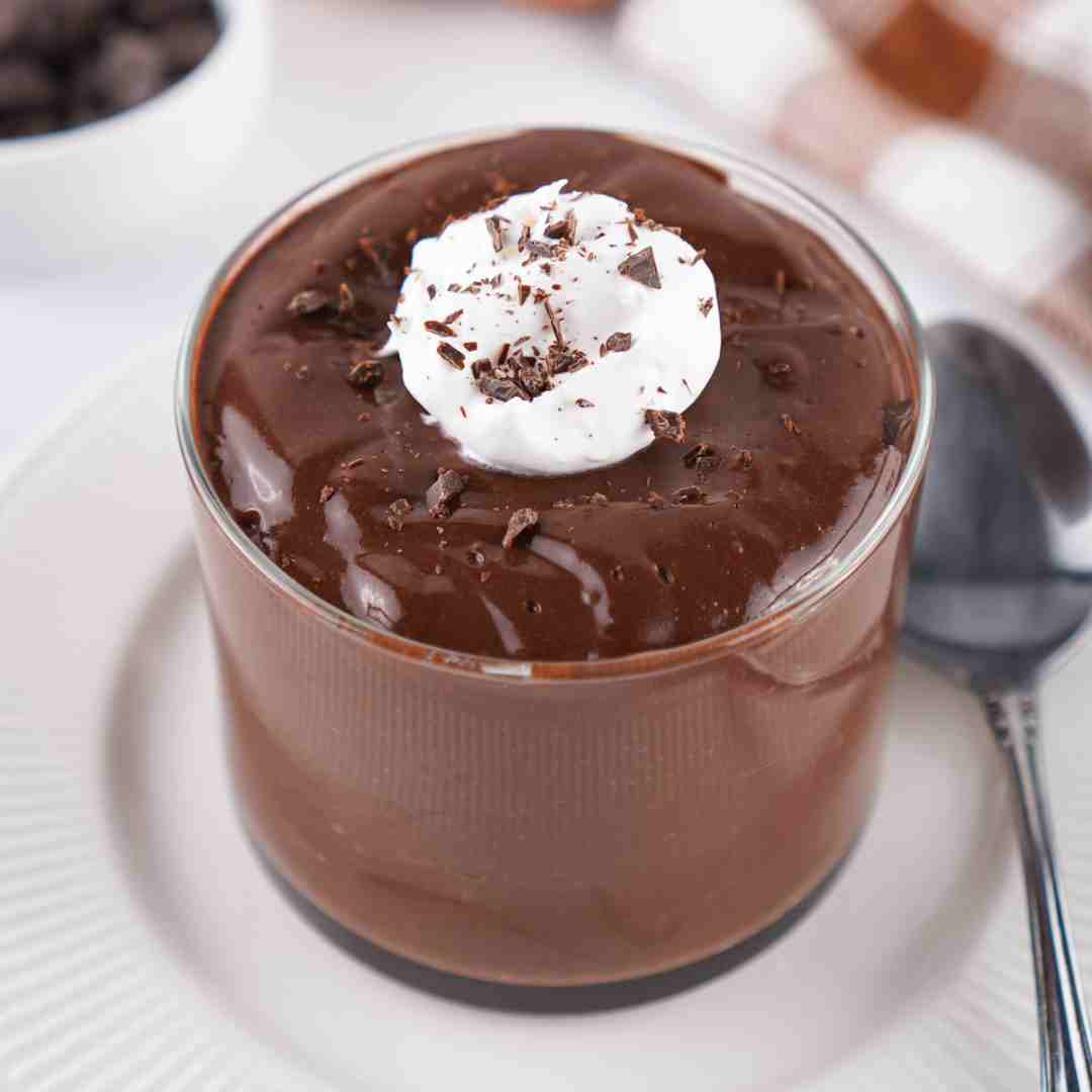 Hardboiled egg chocolate pudding with a dollop of whipped cream.