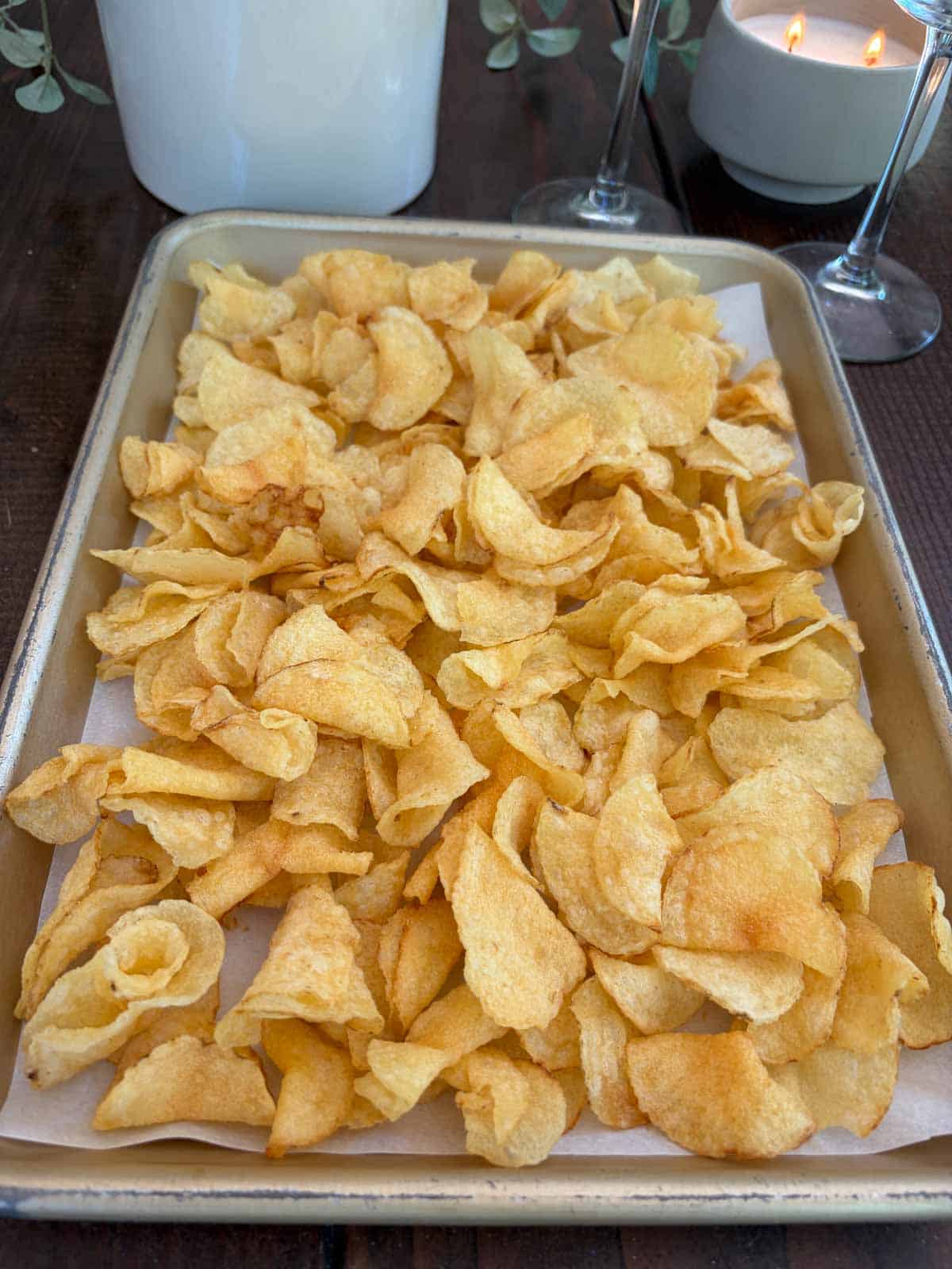 Kettle chips on a baking sheet.